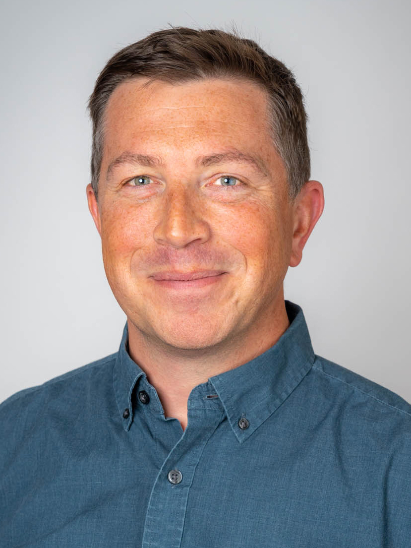 photo of a man in blue shirt